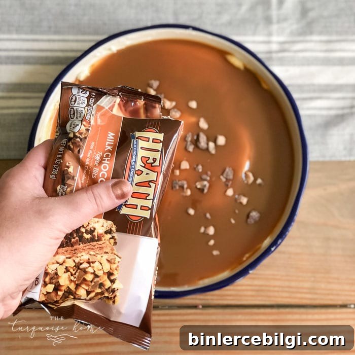 Sprinkle the toffee bits on top of the caramel. | Cream Cheese Caramel Apple Dip Recipe