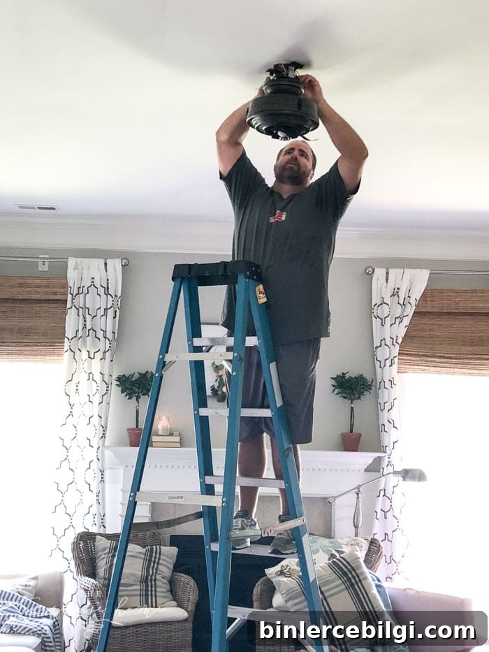 This beautiful farmhouse ceiling fan was the easiest light fixture installation ever!! #farmhouseceilingfan #ceilingfan #farmhouse #joannagaines #theturquoisehome #diyhomedecor