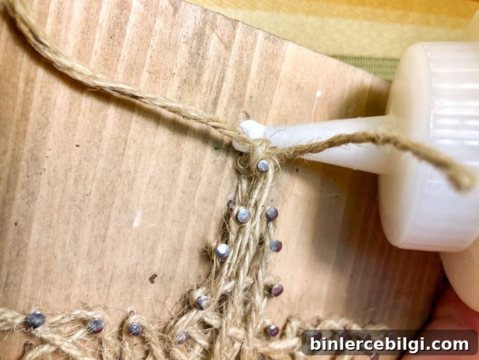 gluing the last string on nail art