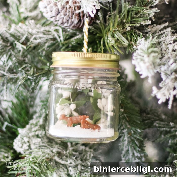 Mini deer and bottle brush trees in a jar