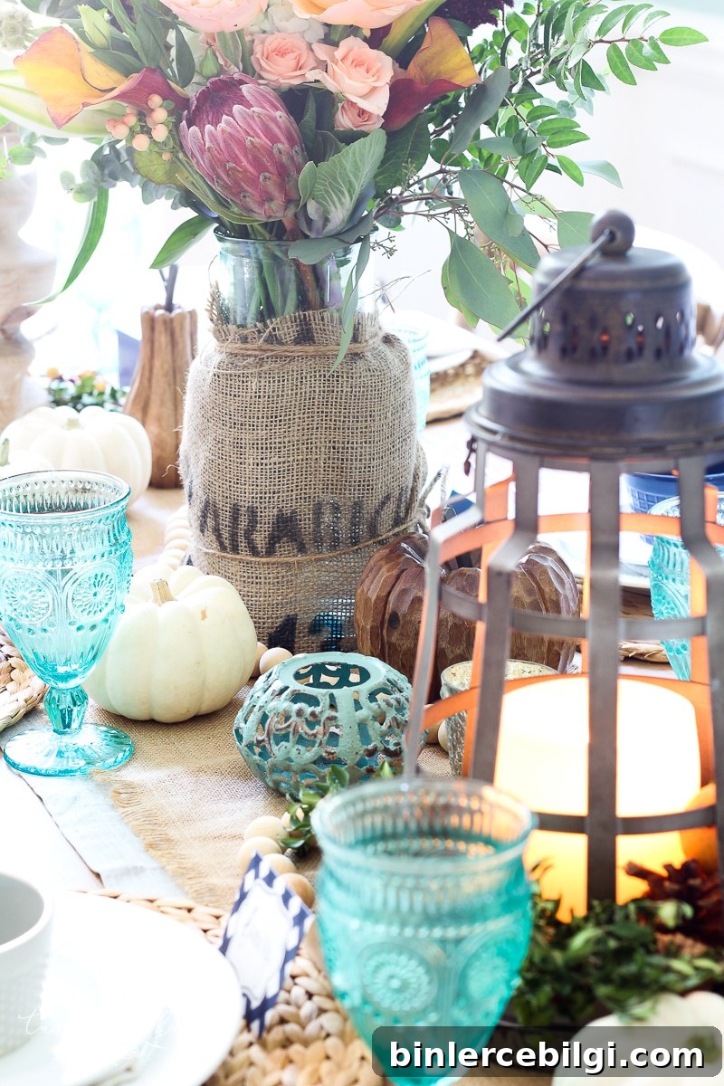 Budget-Friendly Fall Decor Ideas for a Cozy Home 8 Lantern, Candles and Farmgirl Flowers Fall Tablescape