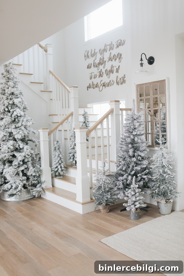Forest of flocked trees creating a hygge winter scene