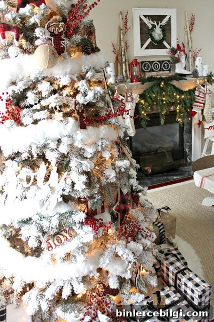 Rustic farmhouse flocked tree by the mantel