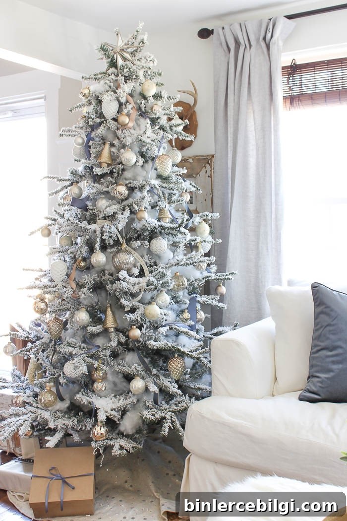 Flocked Christmas Tree with gold and champagne ornaments