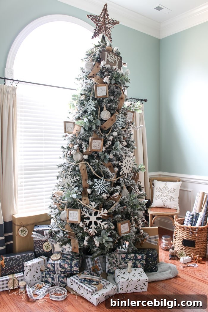 Farmhouse style flocked Christmas tree with natural elements