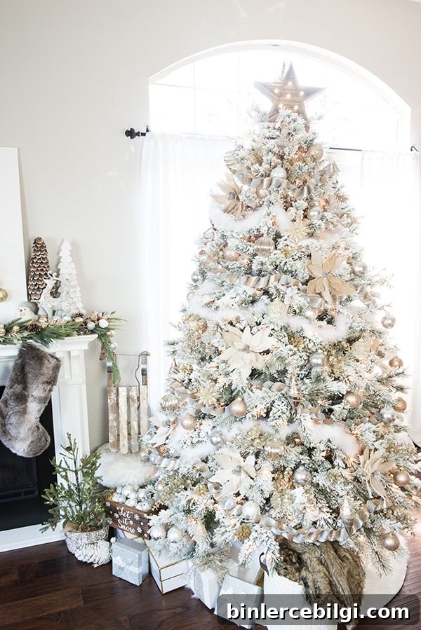 Elegant flocked Christmas tree with gold and silver accents