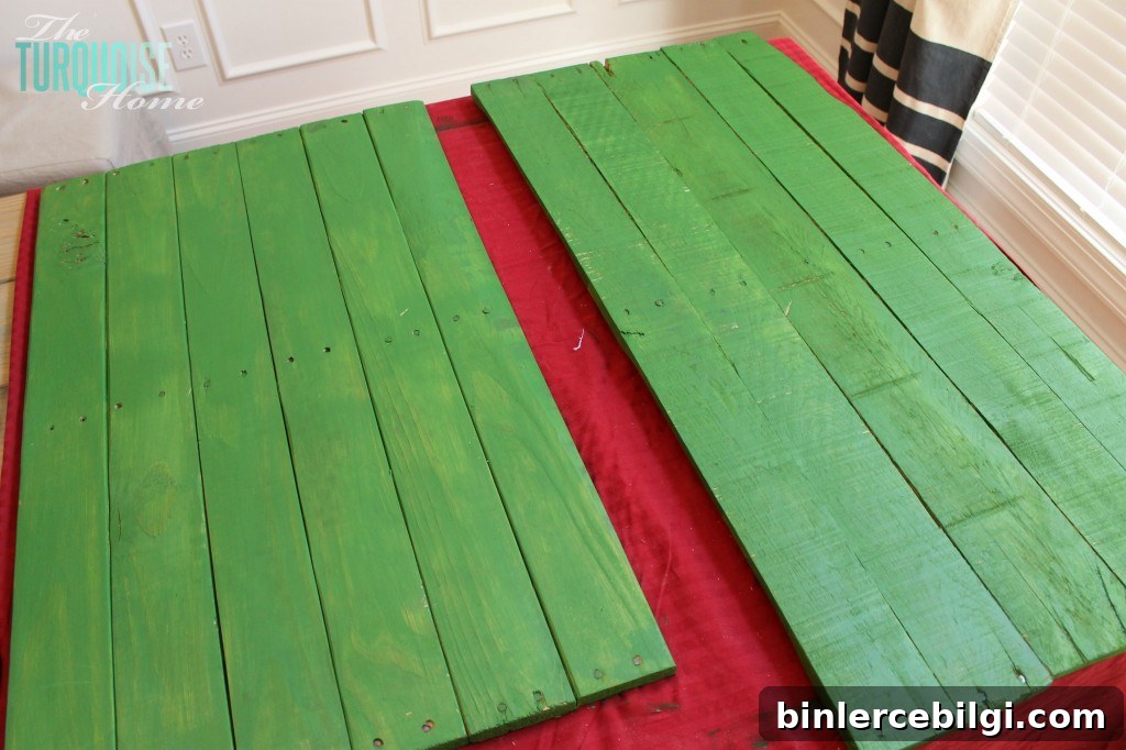 painted green pallet signs
