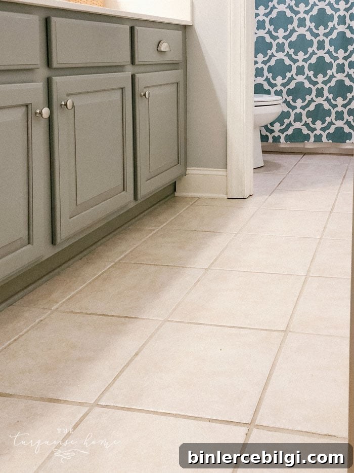 The girls' bathroom tile before peel & stick floor tiles.