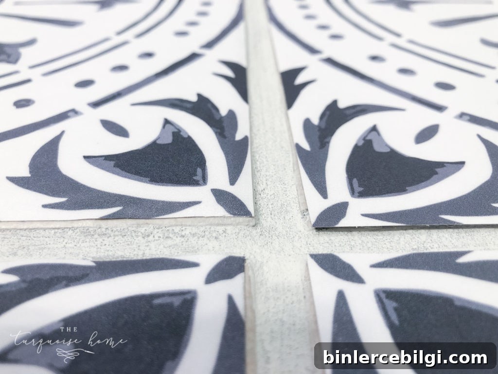 DIY Peel and Stick Vinyl Tile Flooring --> on the right they are regular sized and the left ones are trimmed