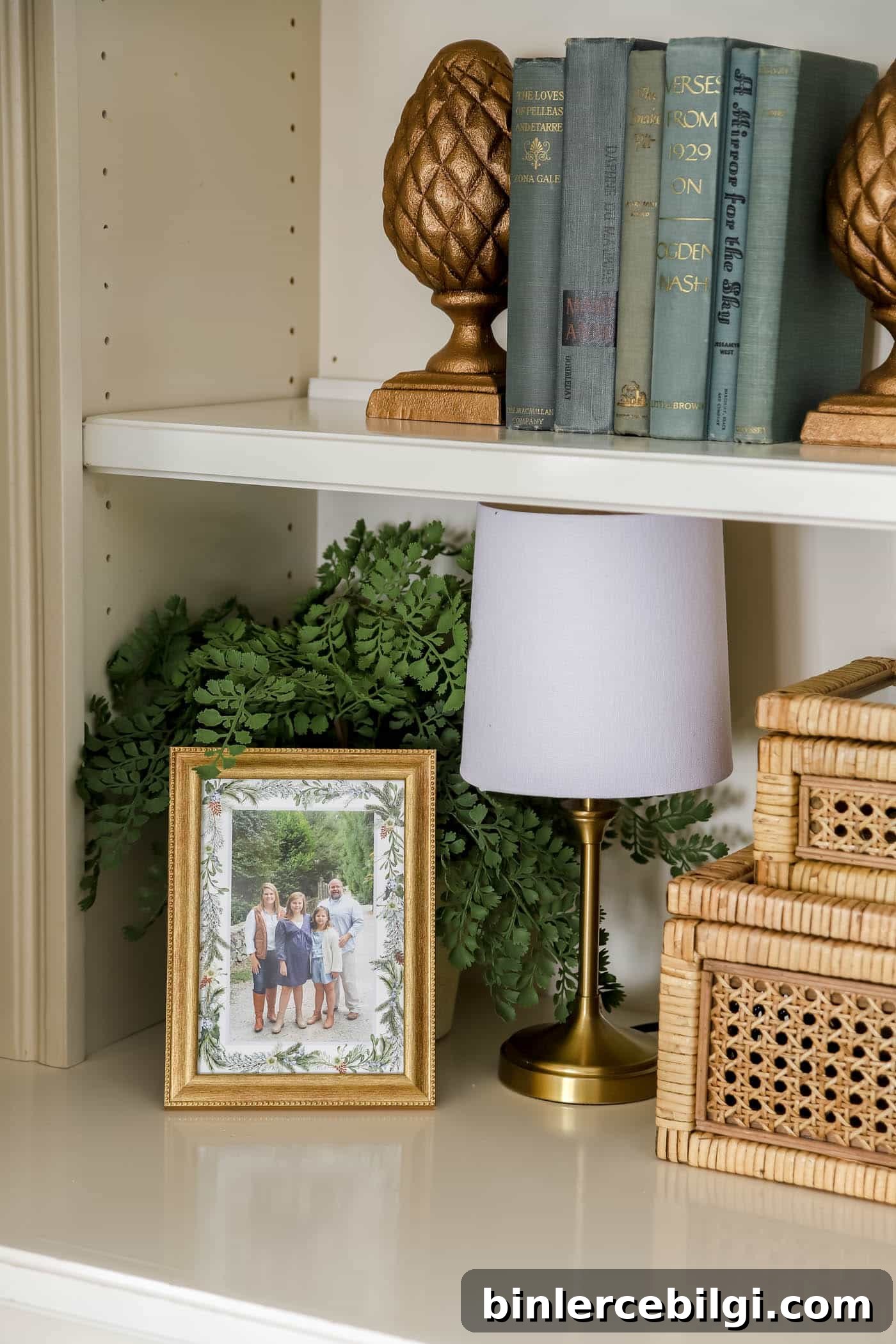 gold and blue bookshelf decor.
