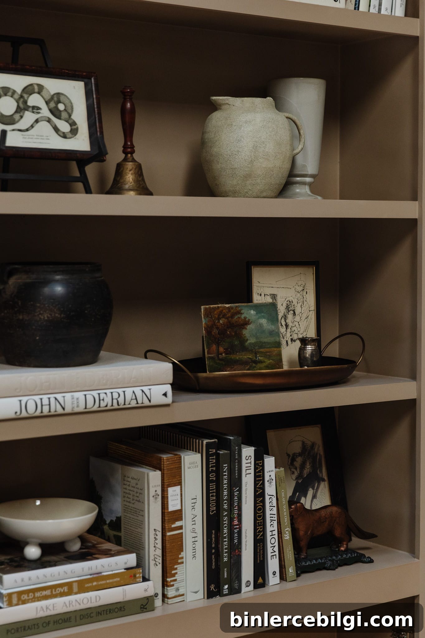 Bookshelf decor example with books and decorative items