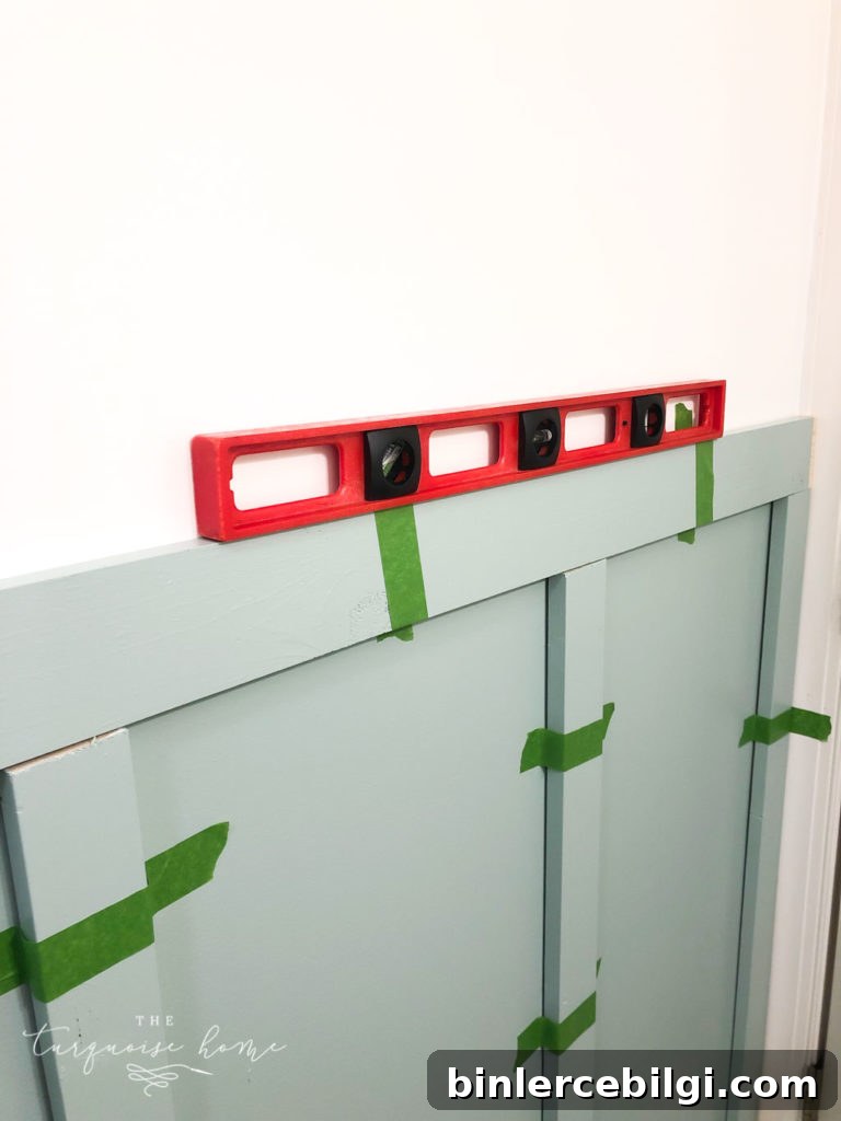 DIY Board and Batten Tutorial -->> make sure all boards are level!