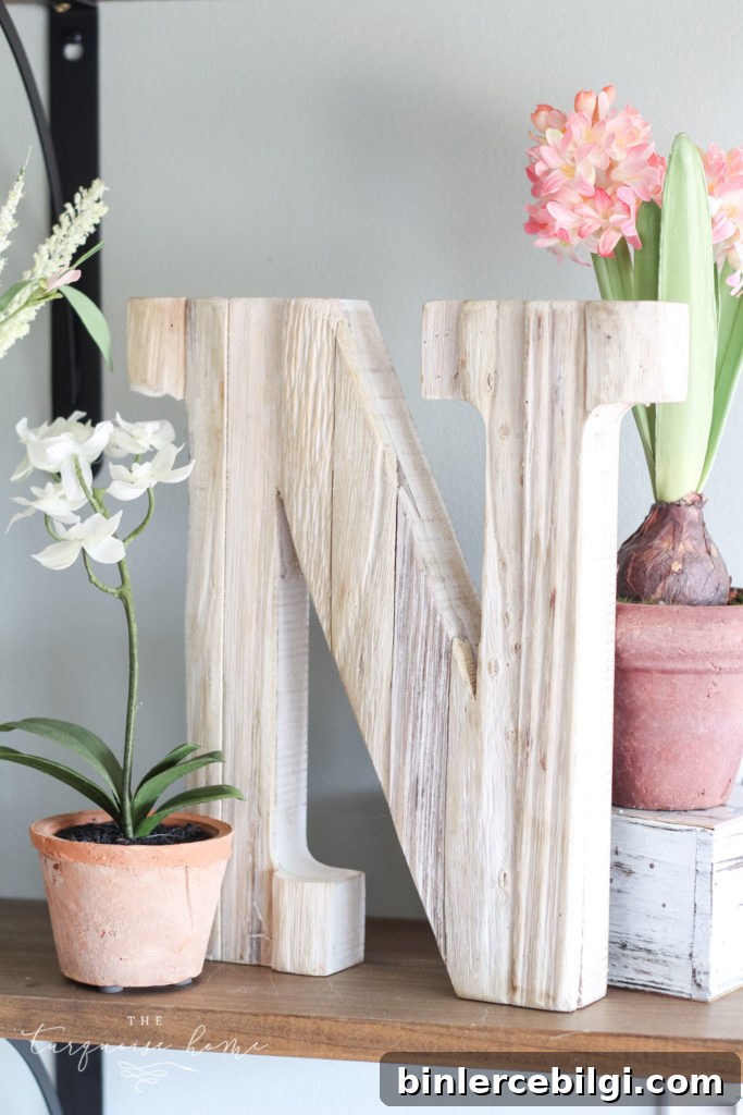 Spring Home Tour at a Flower Shop: Floral Home Decor Ideas 14 Faux orchids and other flowers make for gorgeous spring decor!