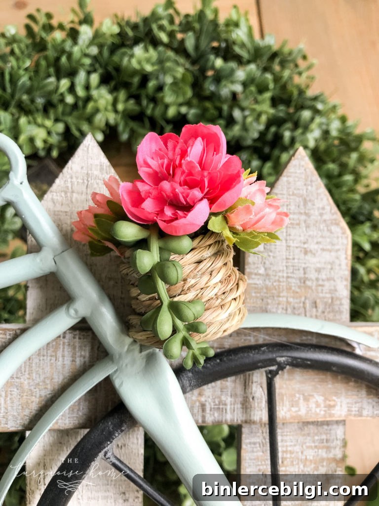 DIY Boxwood Bicycle Wheel Wreath for Front Door 7 DIY Boxwood and Bicycle Spring Wreath - adding flowers to the basket