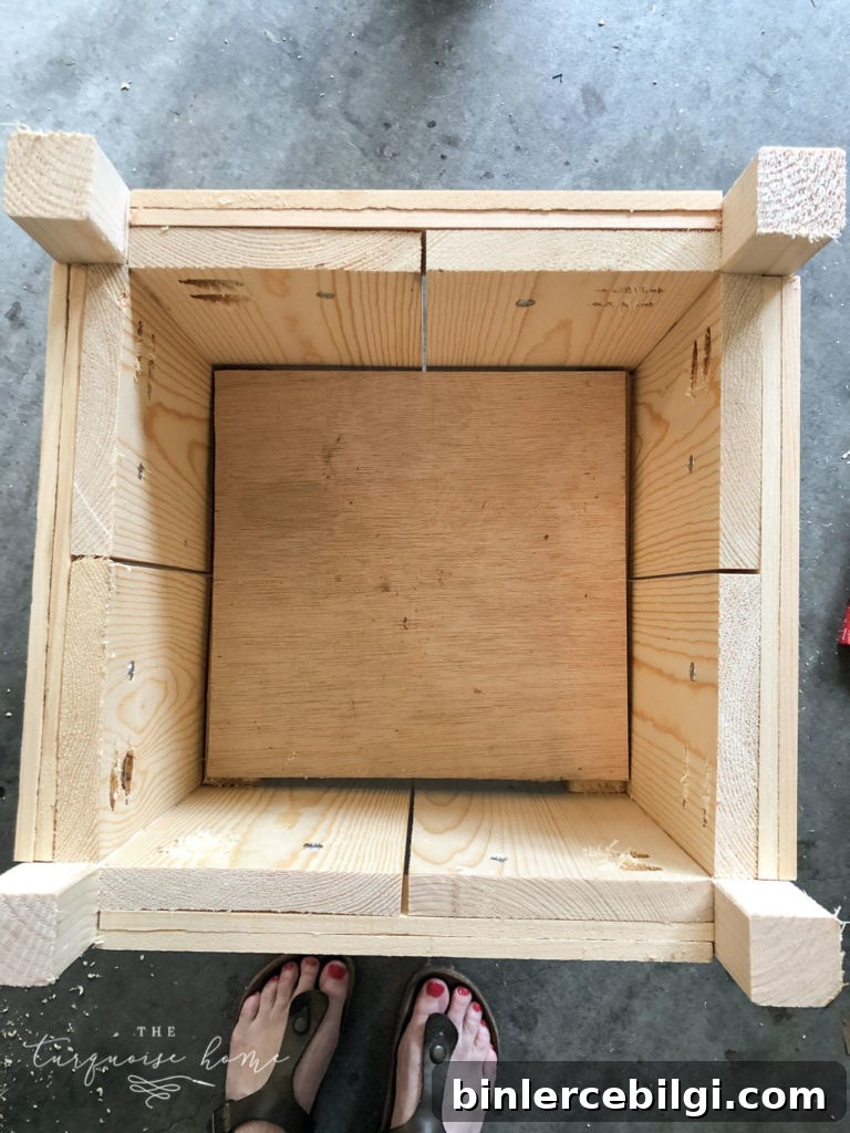 Place cut piece of plywood or wood strips on cleats to create the planter floor