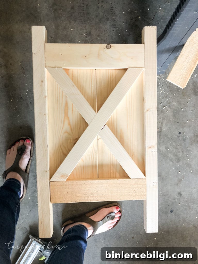 Add the X pieces to the sides