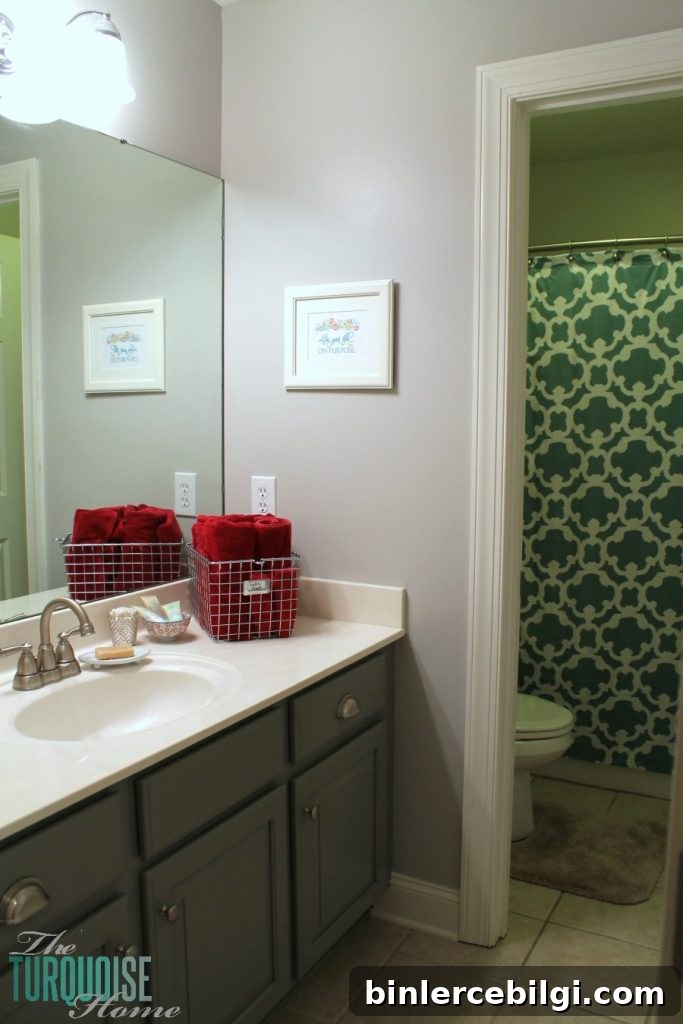 Traditional-Americana Guest Bathroom Update: painted walls, cabinets, new hardware and a punch of color!