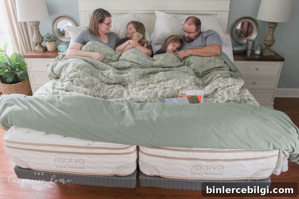 Kids playing on a bed made from two twin mattresses