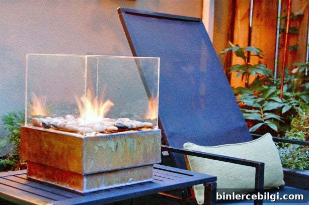 DIY Fire Pit Ideas and Where to Buy Them 8 Contemporary glass and rock firepit