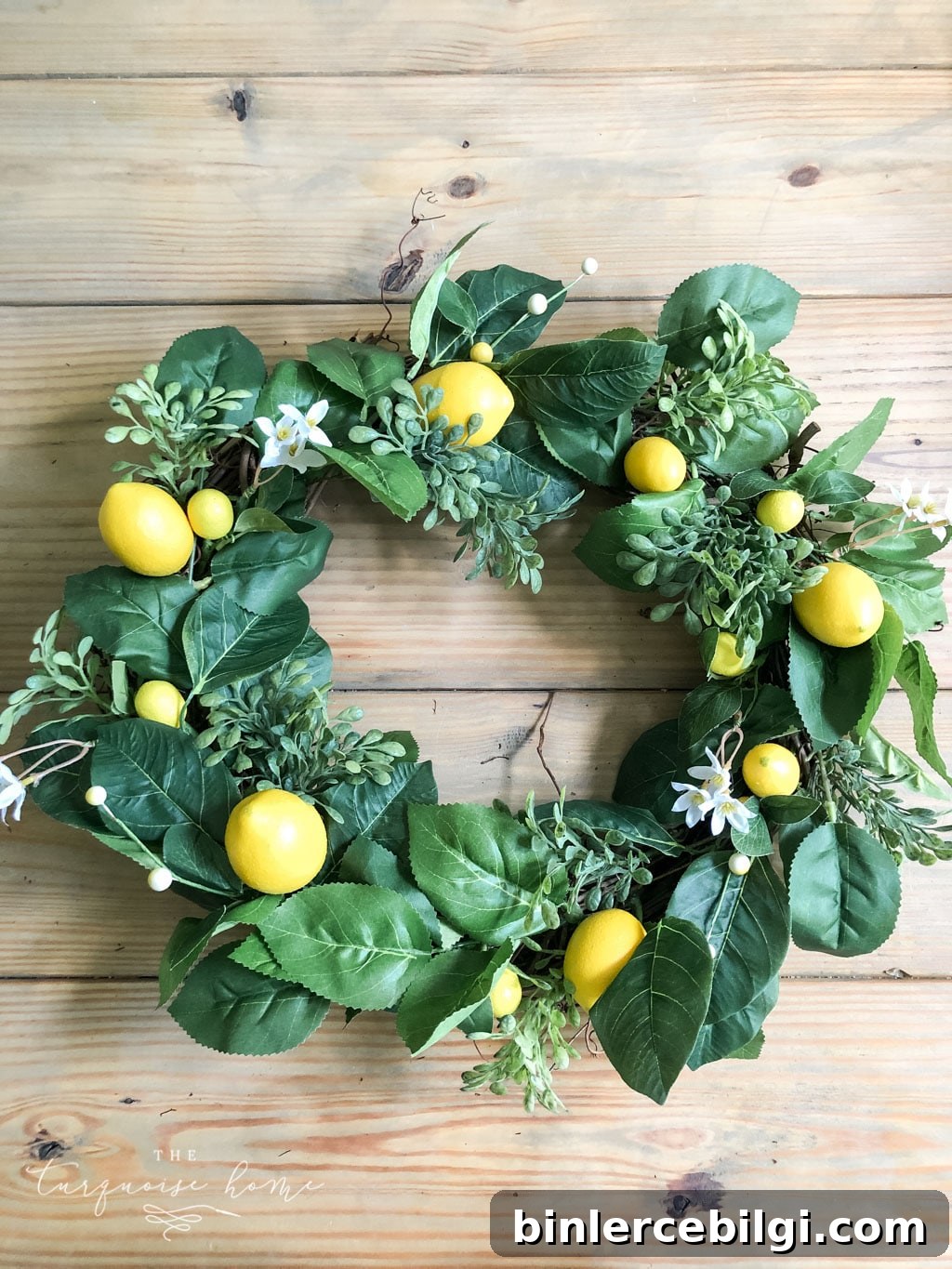 DIY Summer Lemon Wreath: next add in the lemons and other faux-tanicals