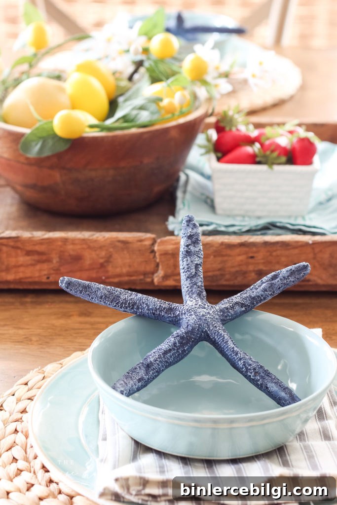 Simple Summer Tablescape with lemons, strawberries and turquoise dishes
