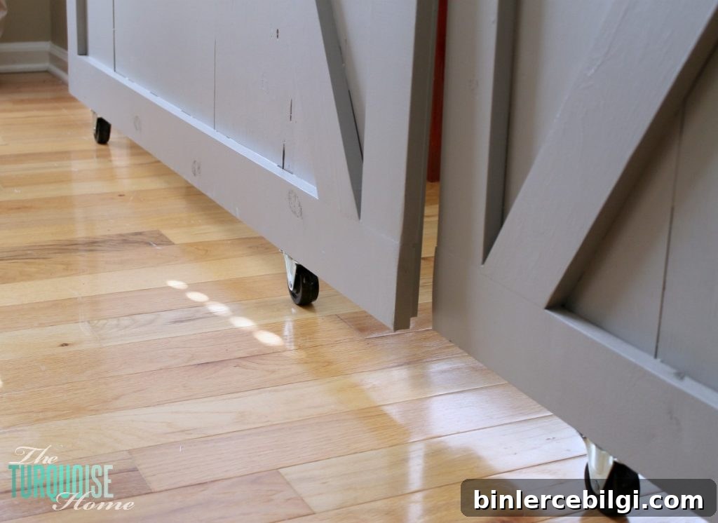 DIY Simple Sliding Barn Doors | TheTurquoiseHome.com