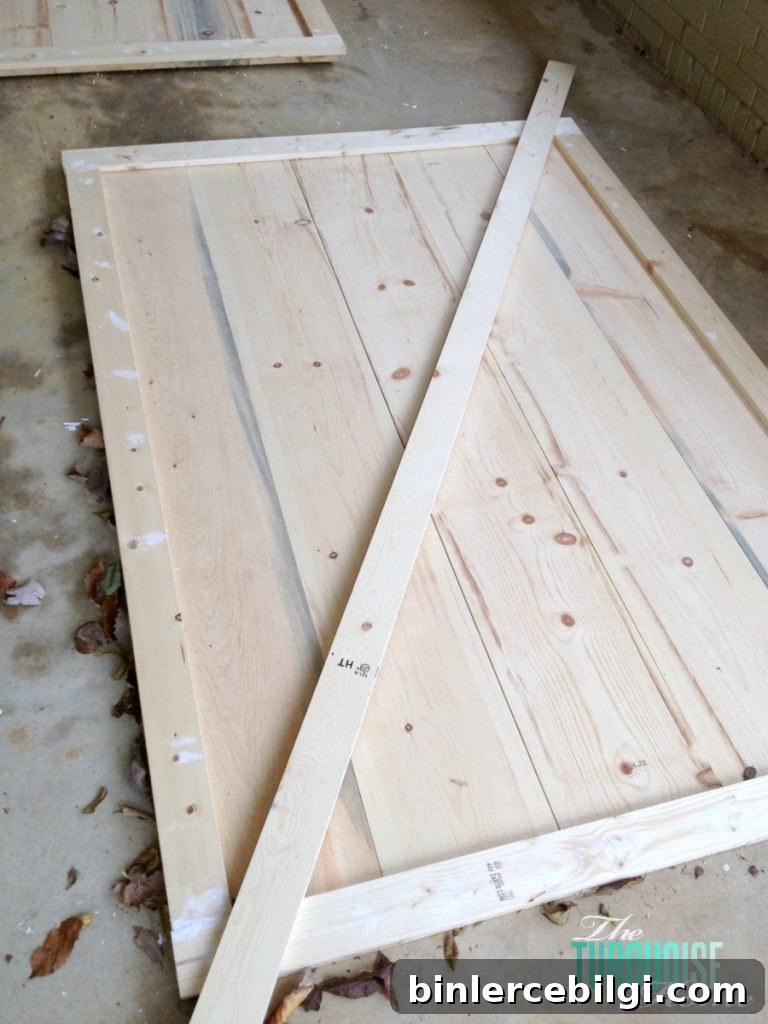 DIY Simple Sliding Barn Doors | TheTurquoiseHome.com