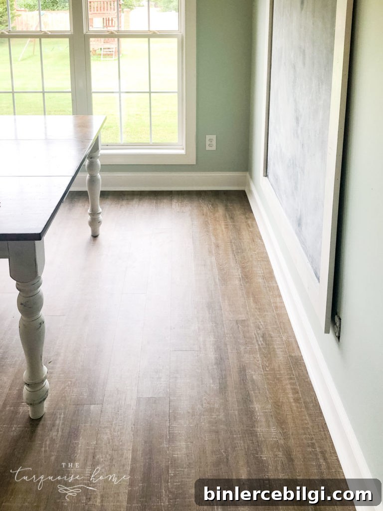 New Luxury Vinyl Plank floors | COREtec Boardwalk Oak flooring | LVP - the coastal farmhouse style of these floors are perfect for my home!