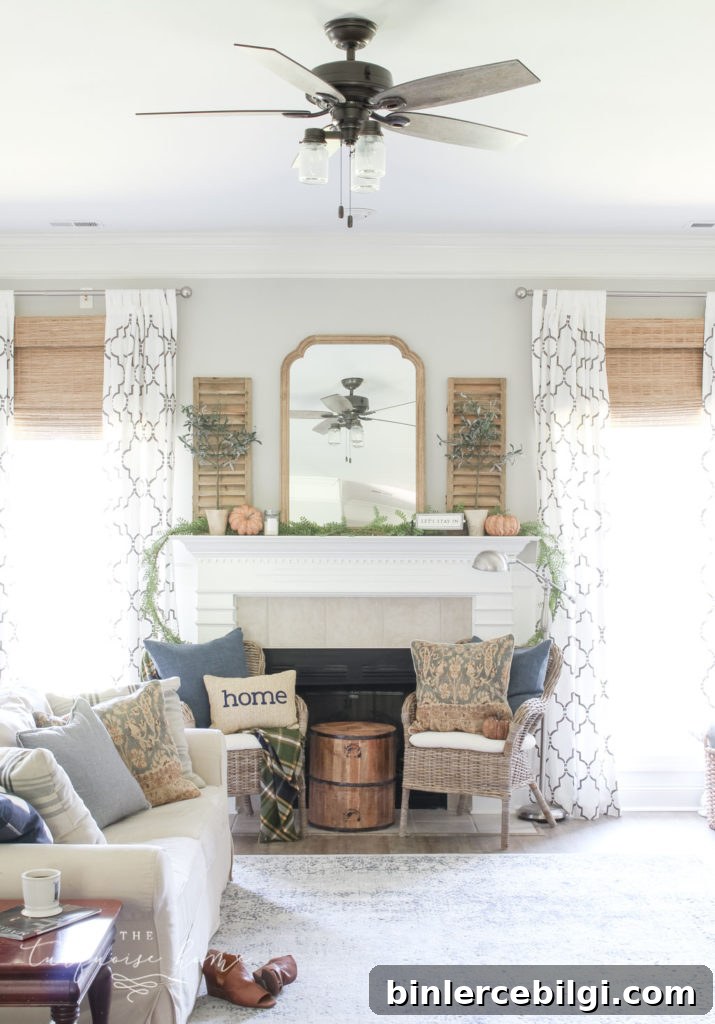 Beautiful blues and browns in this fall decorated living room.