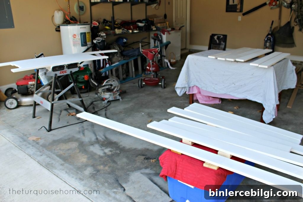 prepping white boards in garage for board and batten
