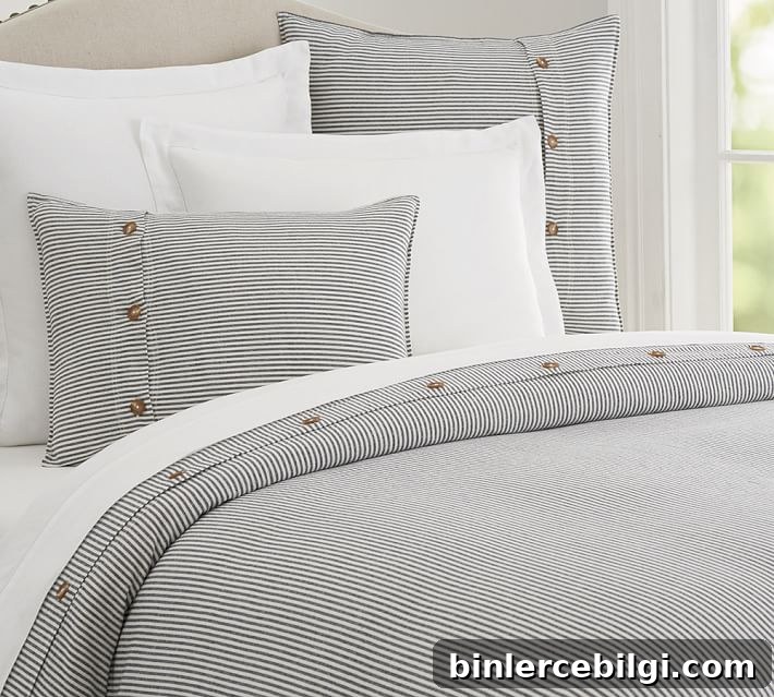 Farmhouse Bedding Ideas to Transform Your Bedroom 14 Navy and White Duvet with Button Trim | farmhouse bedding