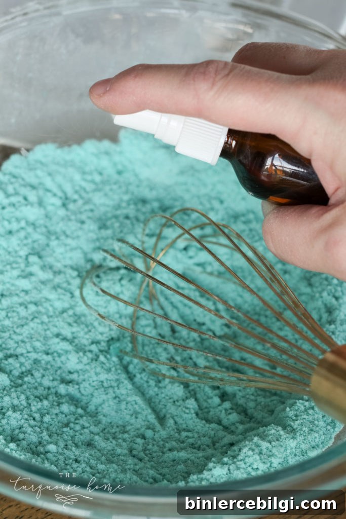 How to Make Bath Bombs with a Free Printable Gift Tag 7 DIY Bath Bombs - mist the mixture just a little bit to give it the consistency of snow.