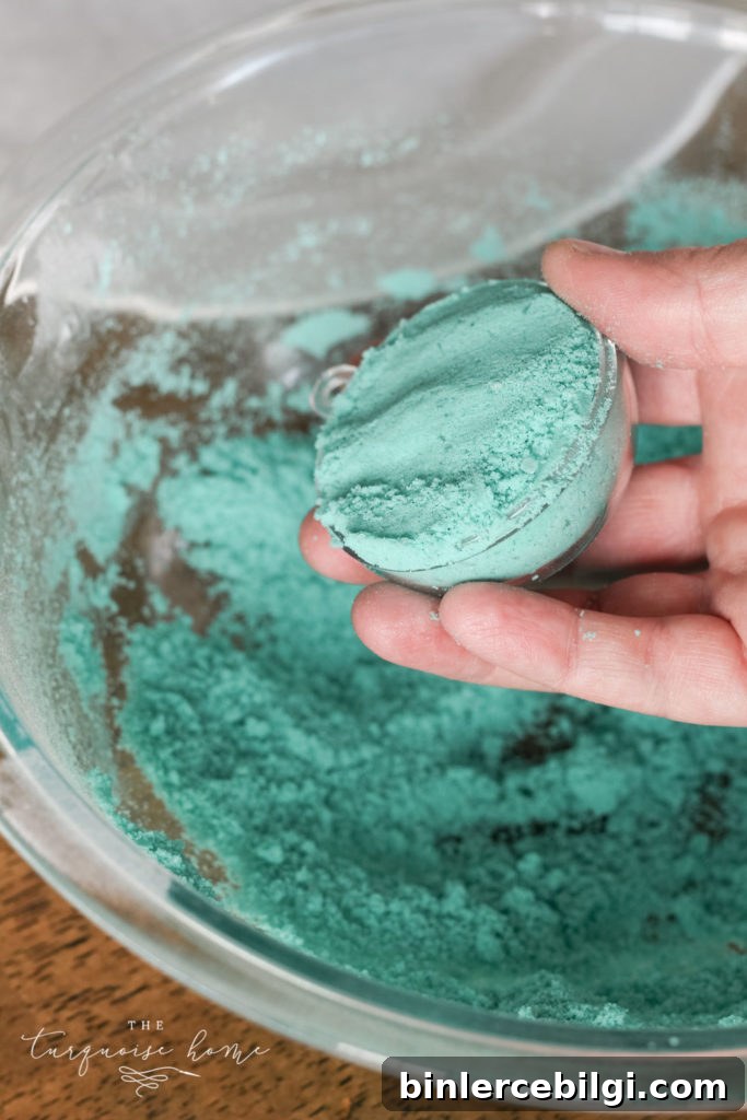 How to Make Bath Bombs with a Free Printable Gift Tag 8 DIY Bath Bombs - add mixture to each side of the mold