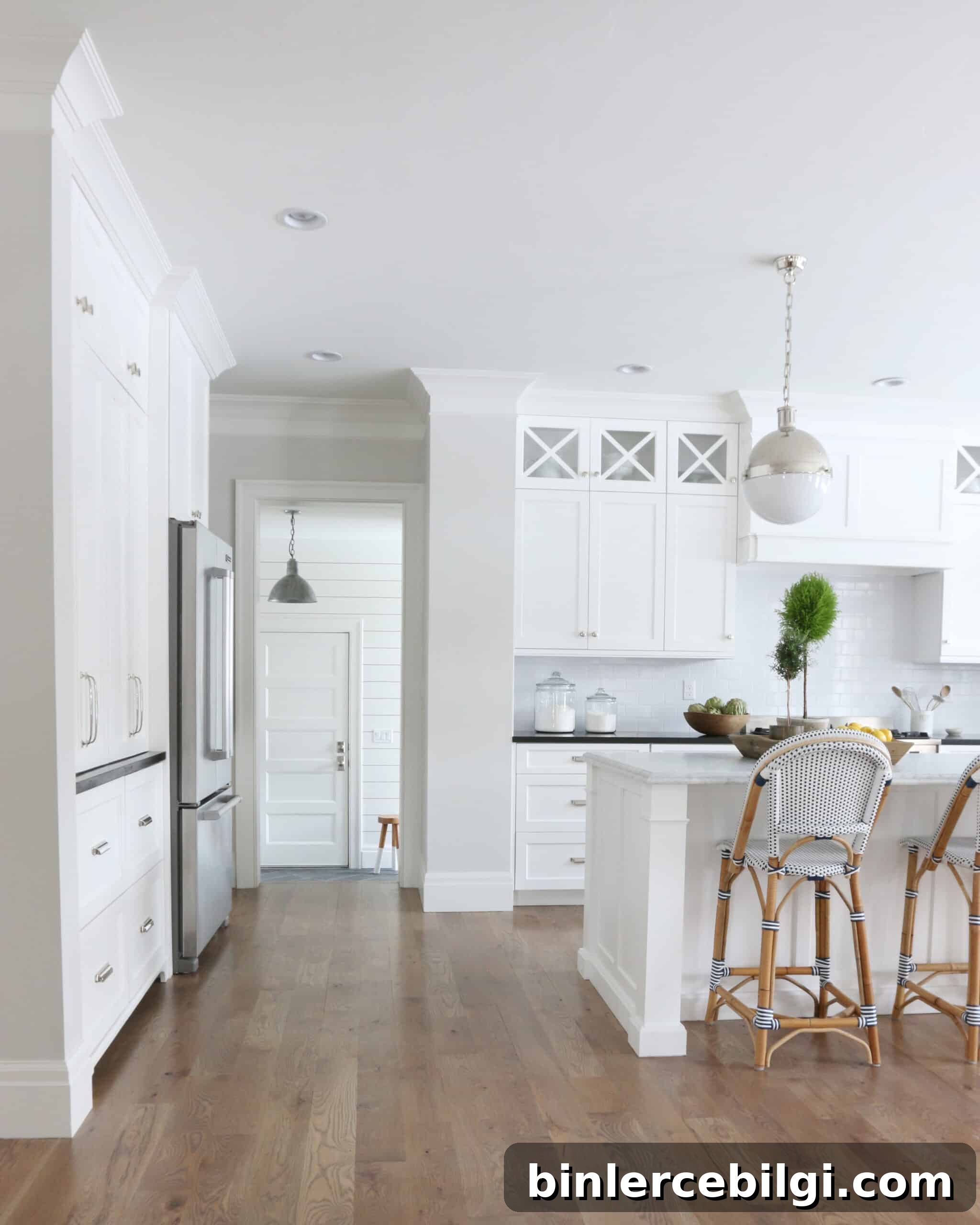 kitchen with Classic Gray walls and white cabinets