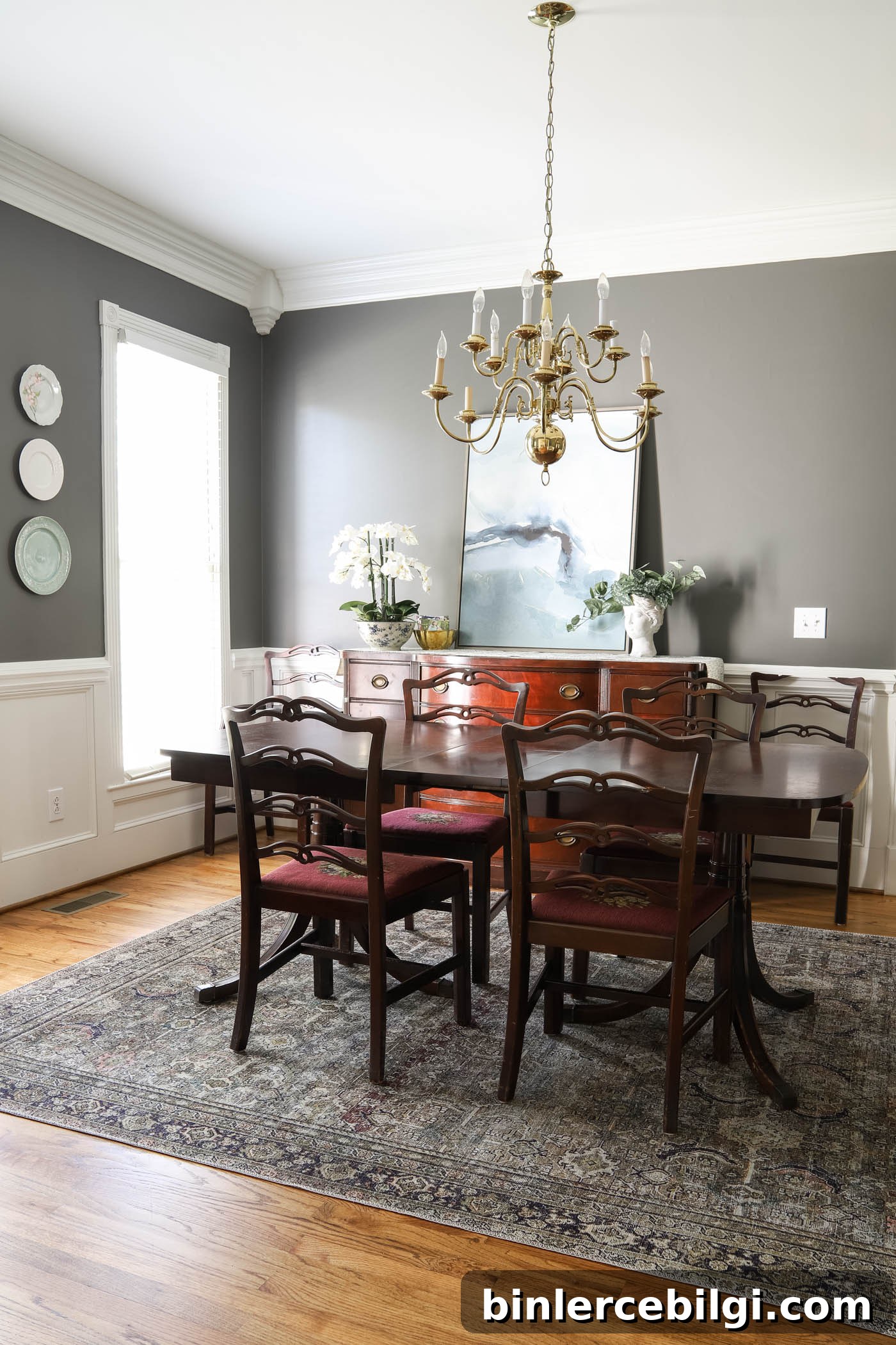 dining room before with charcoal walls and antique furniture.