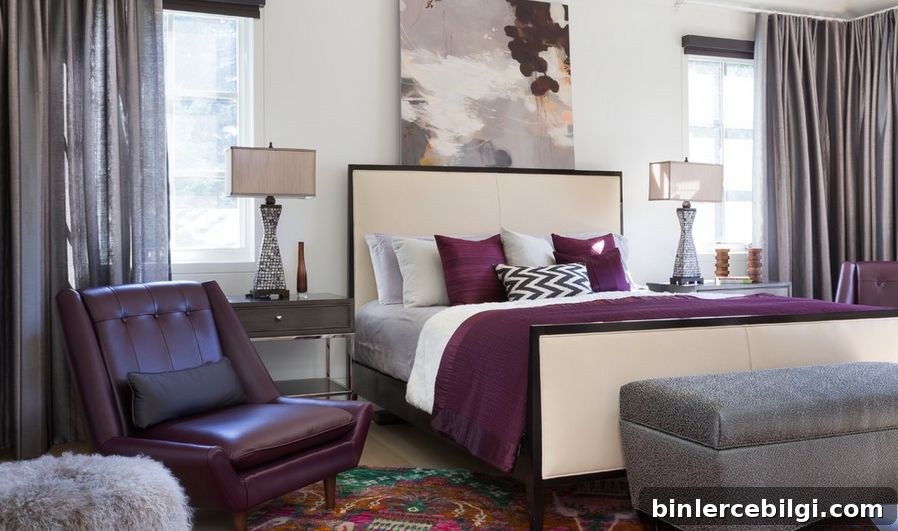 an abstract painting hangs on the wall above a bed