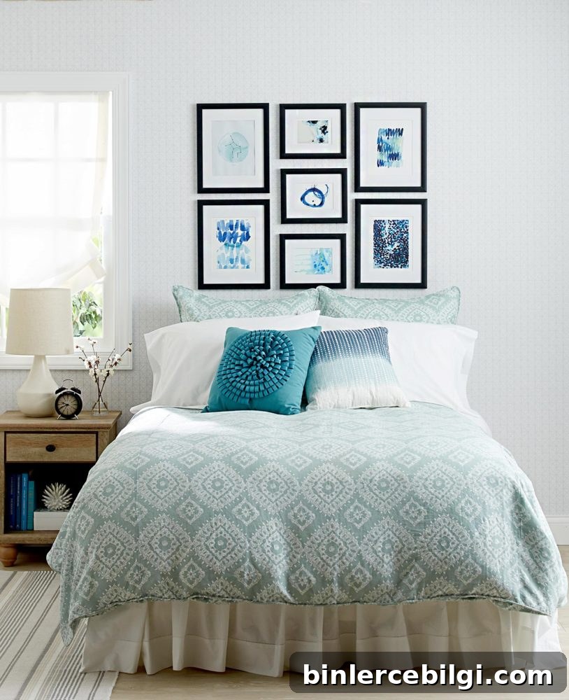 gallery style art hanging above the bed