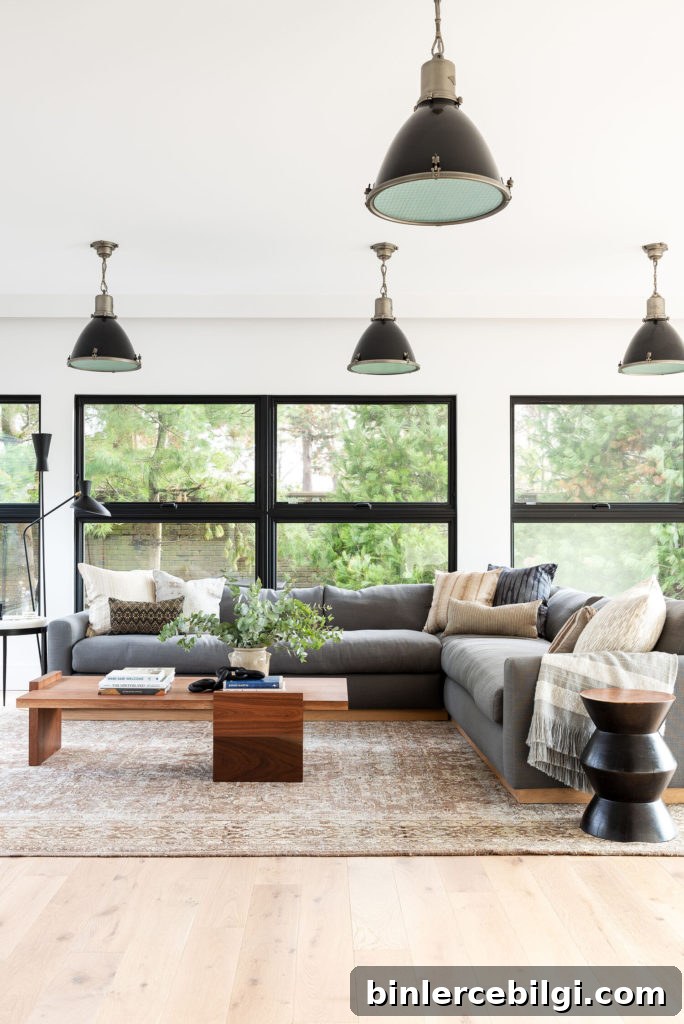 living room with a sectional couch with throw pillows in the corner