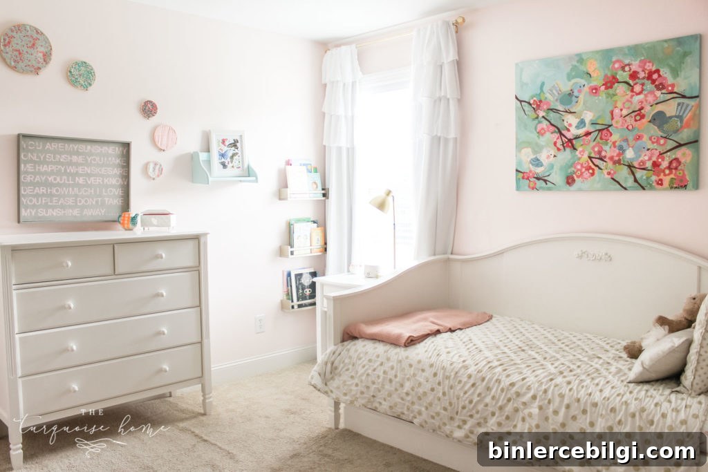Decorated bedroom with white daybed and colorful accents