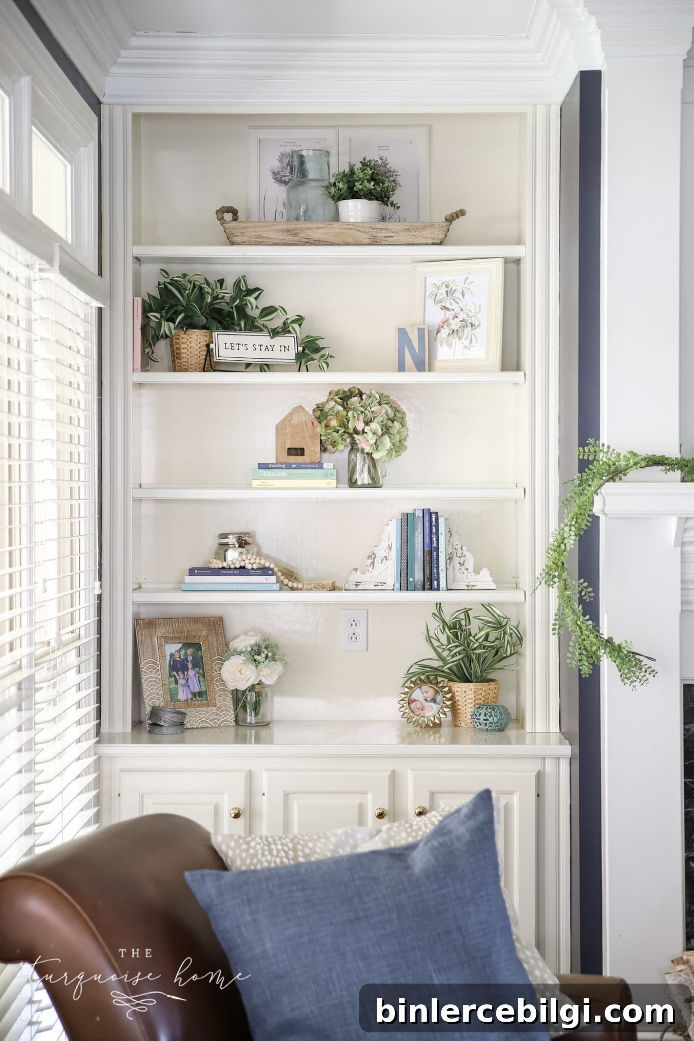 styling bookshelves with different ways of displaying books and trinkets together