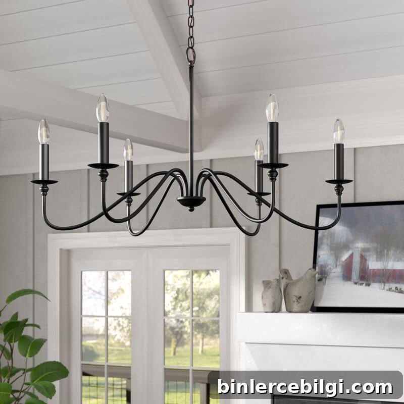 traditional candle style chandelier hanging from a ceiling