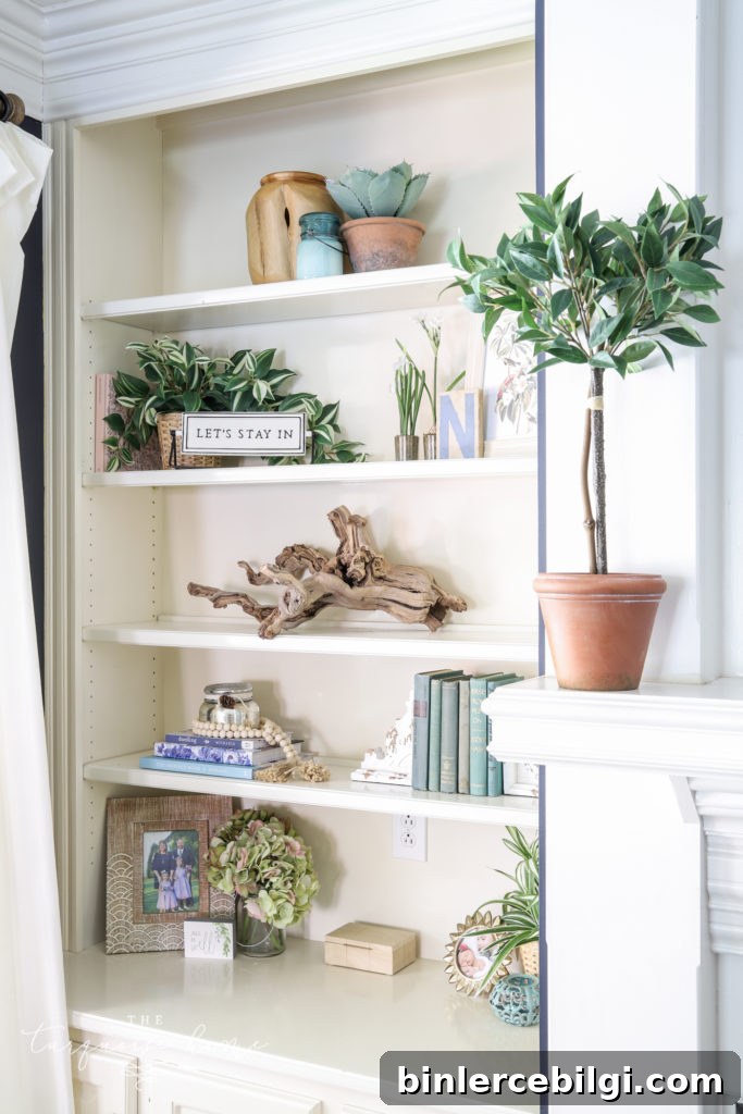 Cozy Navy Blue Living Room Reveal and Decor Ideas 9 Built-in Bookshelves