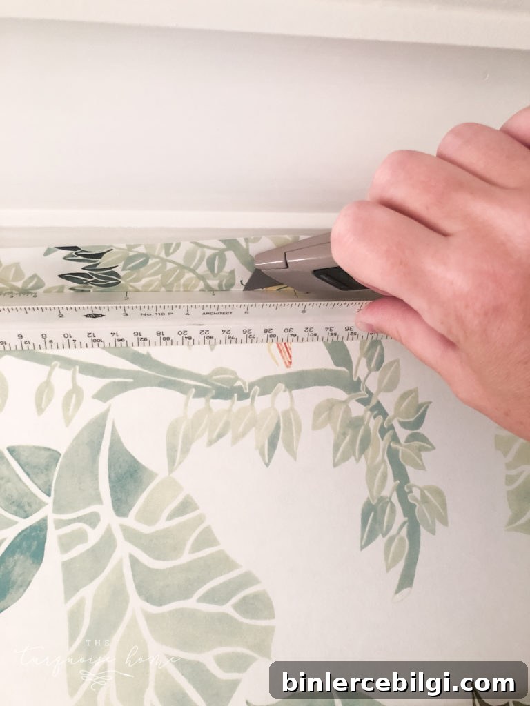 cut off excess wallpaper