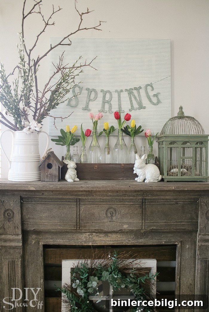 spring decor mantel with bunnies, bird cage, tulips and a spring sign