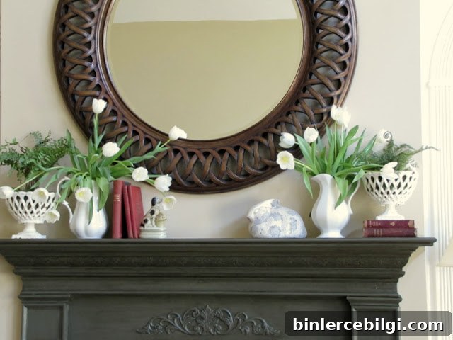 spring mantel design with circle mirror, white tulips and bunnies