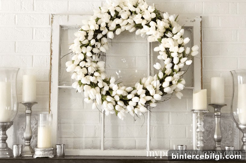 lovely white-themed spring fireplace mantel decor with white tulip wreath
