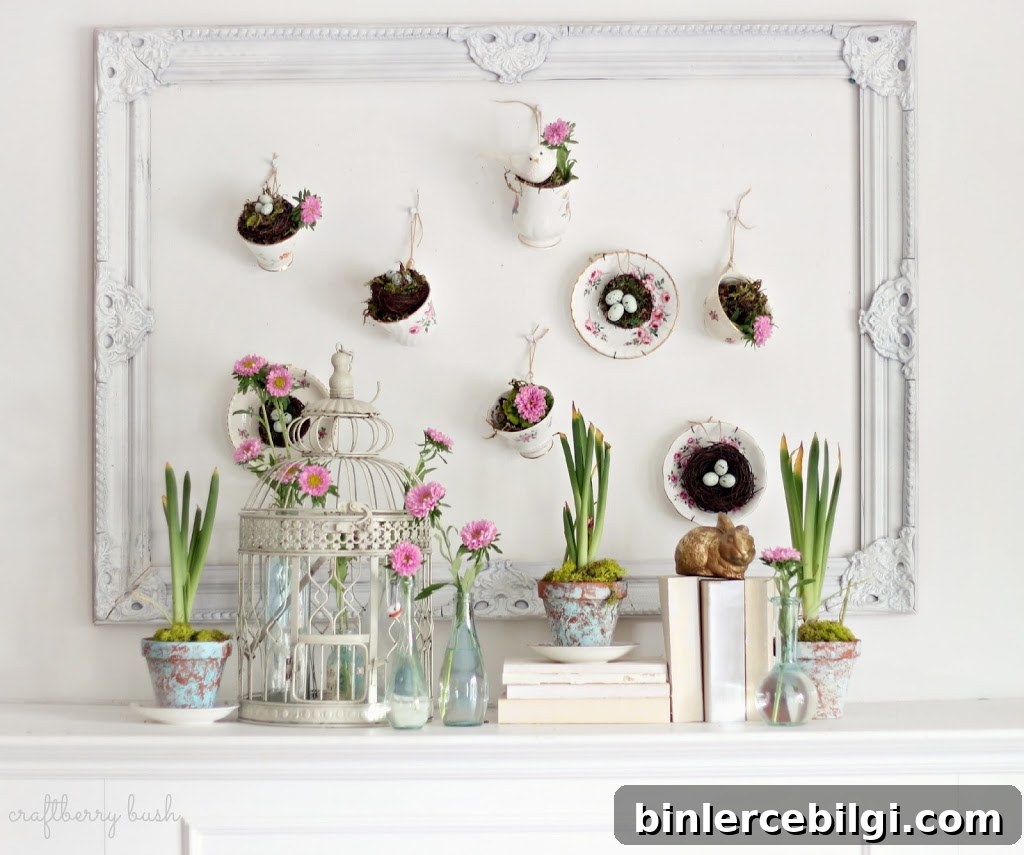 teacups hanging on the wall over fireplace mantel holding spring blooms
