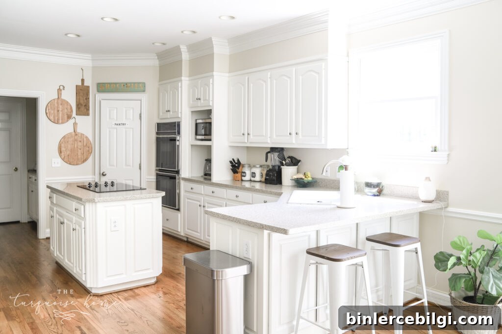 Traditional White Kitchen with Rich Hardwood Floors