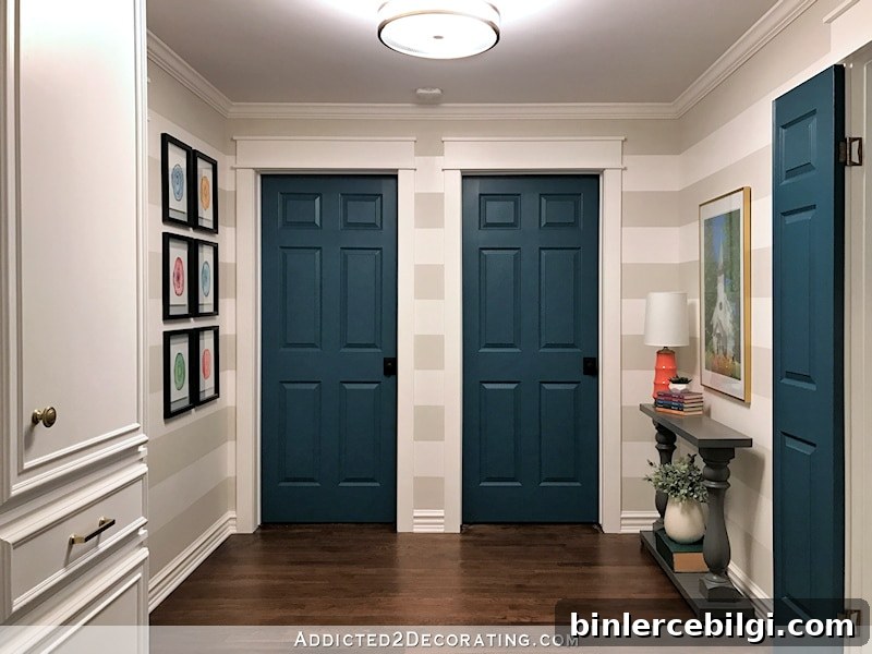 Interior Door Paint Color Ideas to Transform Your Home 9 Foyer with neutral decor and deep blue painted interior doors