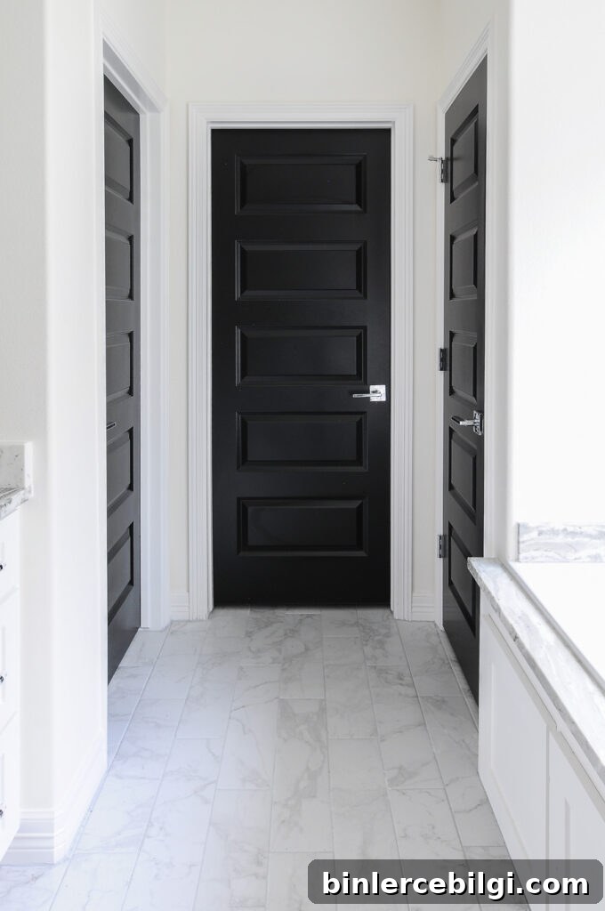 Interior Door Paint Color Ideas to Transform Your Home 11 Hallway with white walls and black interior door paint color